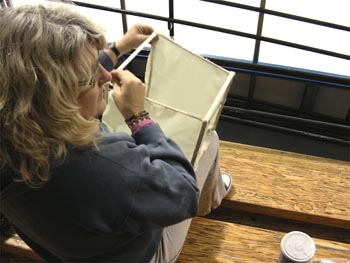 Kathy works on her lampshade