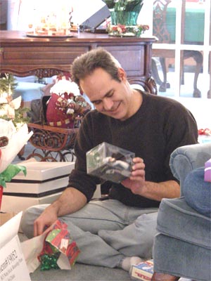 Ted opens the Elvis ornament