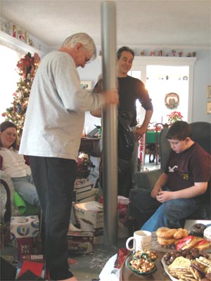 Ted opens his gift from T and C